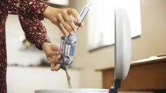 System med dubbla dammbehållare